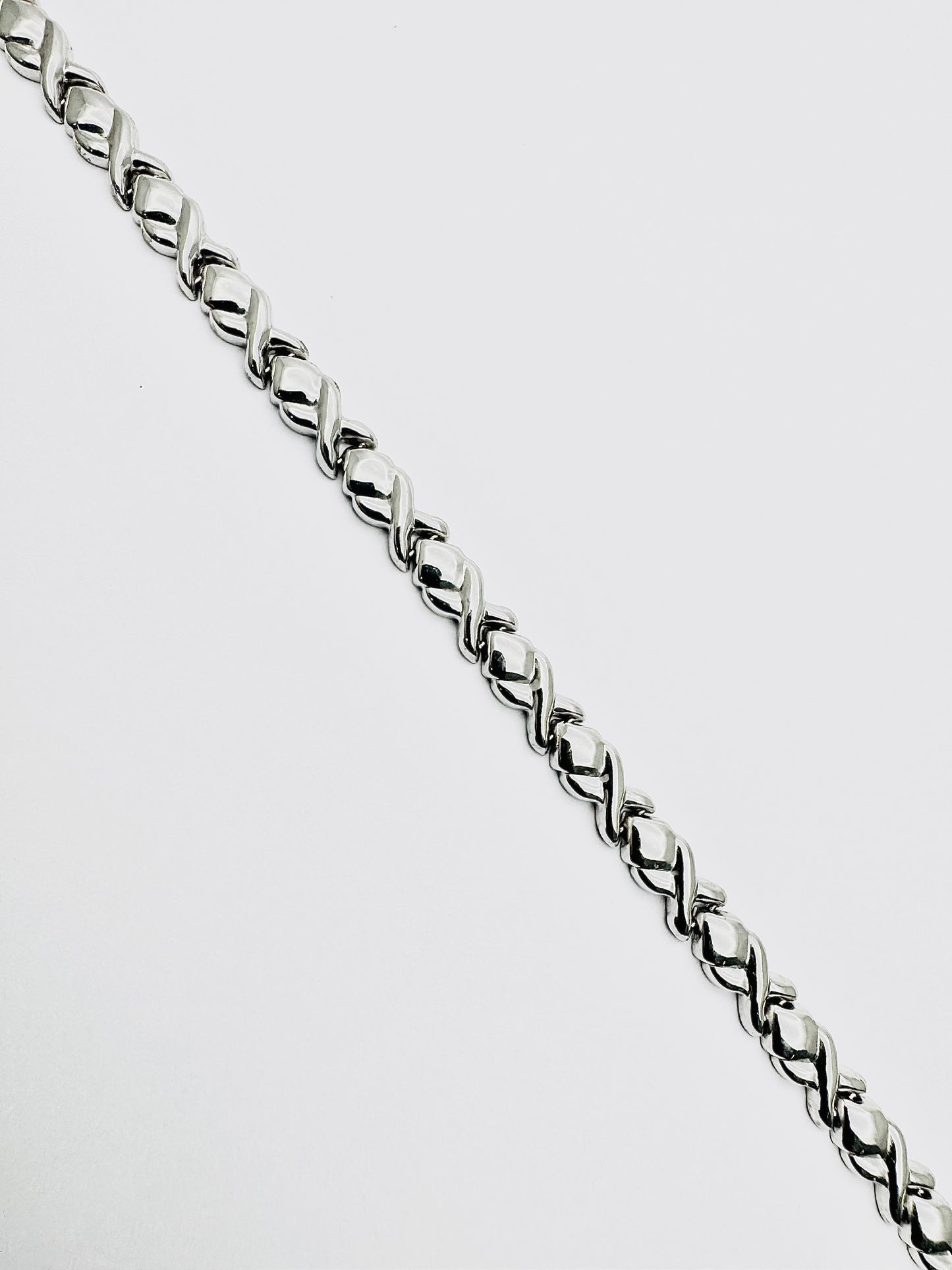 Women's 9ct WG Hugs and Kisses Rigid Bracelet