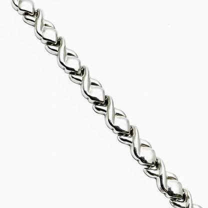 Women's 9ct WG Hugs and Kisses Rigid Bracelet